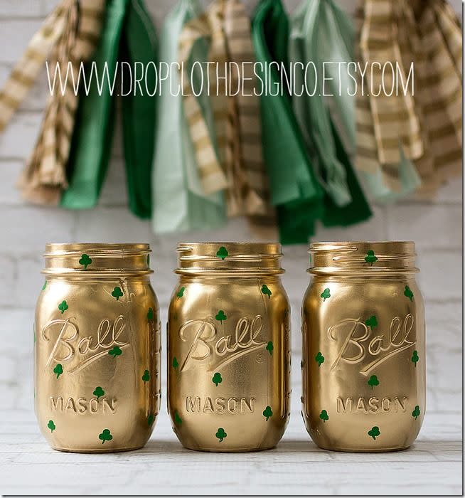 a group of jars with green liquid