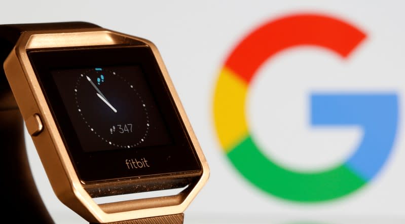 Fitbit Blaze watch is seen in front of a displayed Google logo in this illustration