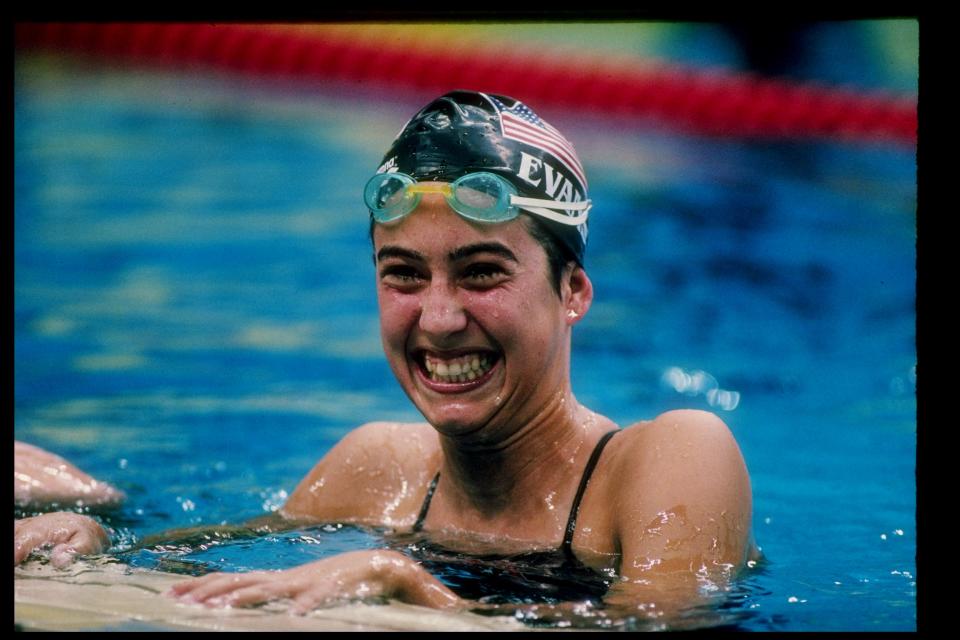 Janet Evans celebrates after a race at the 1988 Olympic Games in Seoul, South Korea.