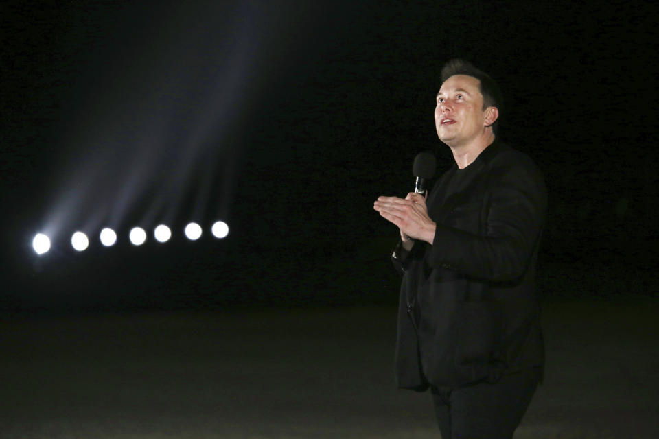 FILE - SpaceX CEO Elon Musk delivers a presentation on Starship development at the company's Boca Chica Launch Complex near Brownsville, Texas on Saturday, Sep. 28, 2019. Many people are puzzled on what a Elon Musk takeover of Twitter would mean for the company and even whether he’ll go through with the deal. If the 50-year-old Musk’s gambit has made anything clear it’s that he thrives on contradiction. (Miguel Roberts/The Brownsville Herald via AP, File)
