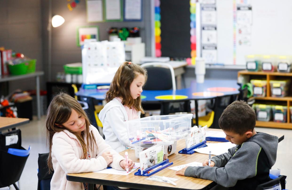 Kindergartners at Sequiota Elementary School draw during class on Tuesday, April 11, 2023.