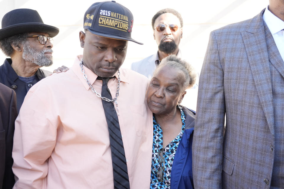 Eddie Terrell Parker, left, stands with his aunt, Linda Rawls, outside the Thad Cochran United States Courthouse in Jackson, Miss., Tuesday, March 19, 2024, following the federal court sentencing of the second of six former Mississippi Rankin County law enforcement officers who committed numerous acts of racially motivated, violent torture on Parker and his friend Michael Corey Jenkins in 2023. Sentencing continues Wednesday morning for the other four former law enforcement officers in federal court. (AP Photo/Rogelio V. Solis)