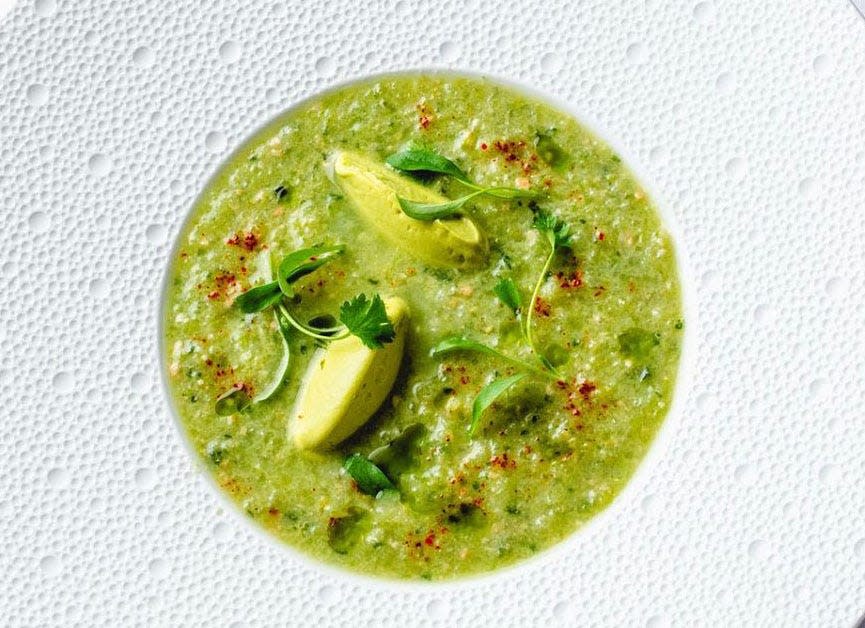 A green-tomato gazpacho is one of two cold soup options at Café Boulud.