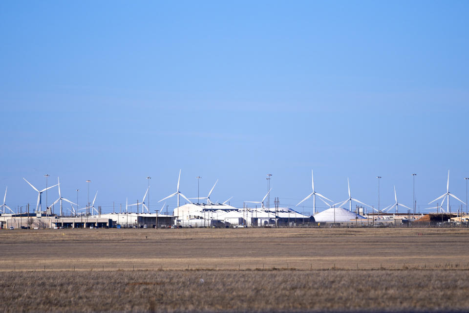 A general view shows the Pantex Plant, Friday, March 1, 2024, in Panhandle, Texas. The plant was briefly shut down during the early part of the Smokehouse Creek Fire on Tuesday, Feb. 27. Climate change increasingly threatens research laboratories, weapons sites and power plants across the nation that handle or are contaminated with radioactive material or perform critical energy and defense research. (AP Photo/Julio Cortez)