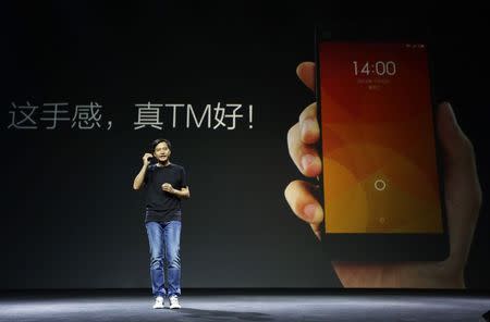 Lei Jun, founder and CEO of China's mobile company Xiaomi, speaks at a launch ceremony of Xiaomi Phone 4, in Beijing, July 22, 2014. REUTERS/Jason Lee