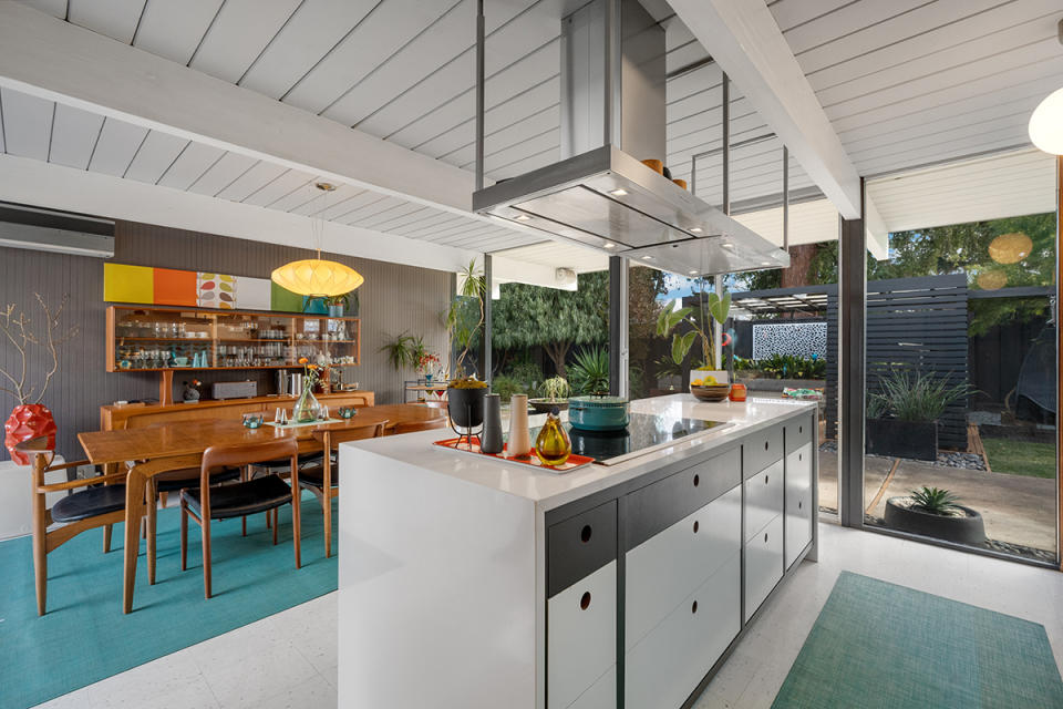The home’s updated kitchen is in keeping with the original midcentury-modern design.