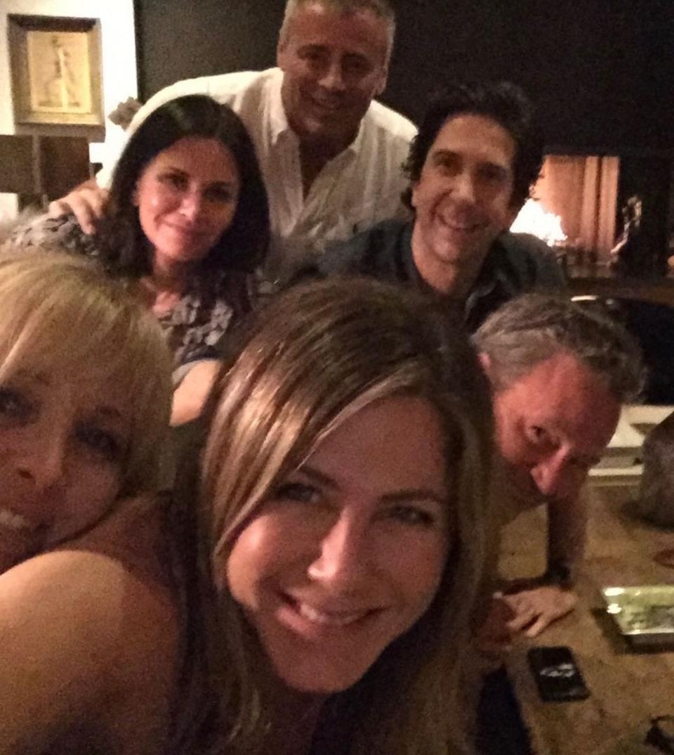 Jennifer Aniston posing with "Friends" costars Lisa Kudrow, Courteney Cox, Matt LeBlanc, David Schwimmer, and Matthew Perry in a selfie.