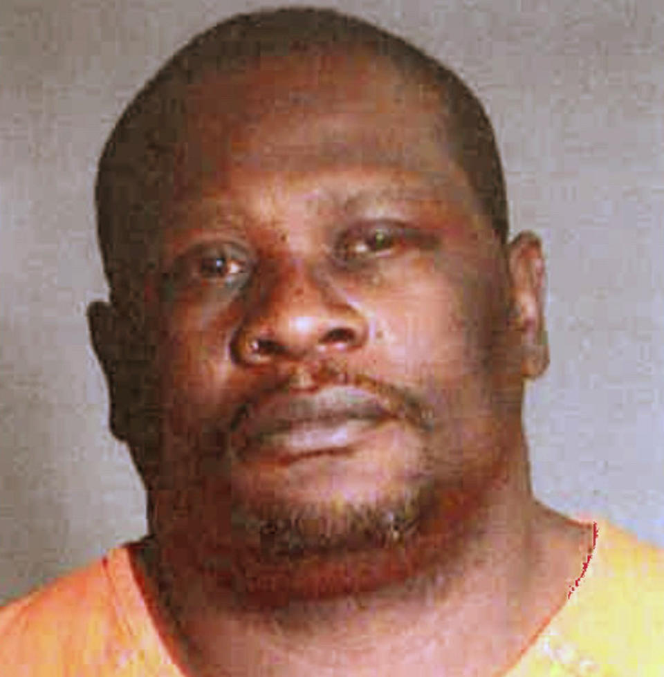 This undated photo provided by Fond du Lac County Sheriff's Department in Fond du Lac, Wis., shows Ruben Houston. Houston who got in a gunfight with police that left a Appleton firefighter dead in the crossfire was identified Friday, May 17, 2019, who had been free on bond pending drug charges. Houston, 47, died in the Wednesday evening incident that erupted just minutes after police and emergency personnel were summoned to a bus where Houston was thought to be suffering a possible seizure. Mitchell F. Lundgaard, 36, a 14-year veteran firefighter, was shot and died of his injuries at a hospital.(Fond du Lac County Sheriff's Department via AP)