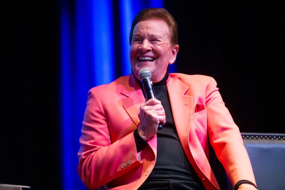 Wink Martindale, a television and radio personality, laughs as he is interviewed by host Tom Brown during the “Conversations on Elvis” event at The Guest House at Graceland as part of the Elvis Birthday Celebration in Memphis, Tenn., on Saturday, January 6, 2024.