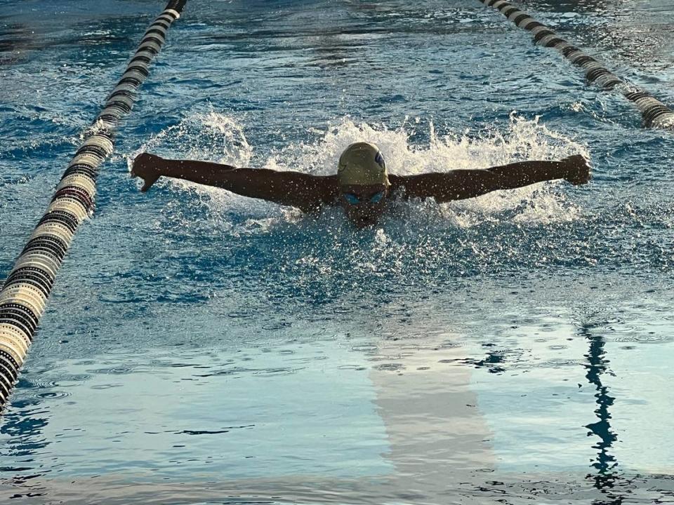 St. Thomas Aquinas senior Julianne McCranie competes in the 100 butterfly, where she finished first with a time of 56.07 and helped the Raiders win the BCAA swimming and diving title on Saturday at the Plantation Central Park Aquatic Complex. Dave Brousseau/Special to the Miami Herald