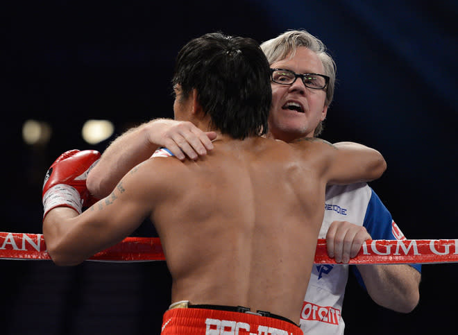   (R-L) Trainer Freddie Roach Gives Getty Images