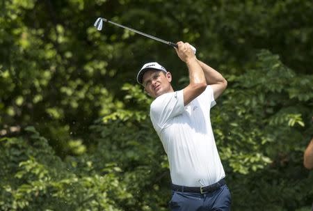 May 27, 2018; Fort Worth, TX, USA; Justin Rose plays his shot from the eighth tee during the final round of the Fort Worth Invitational golf tournament at Colonial Country Club. Mandatory Credit: Jerome Miron-USA TODAY Sports