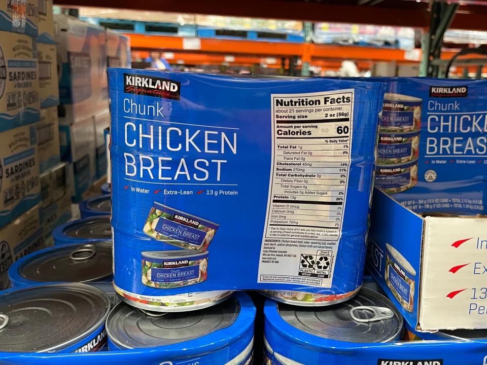 blue package of canned chicken breast on shelf at costco