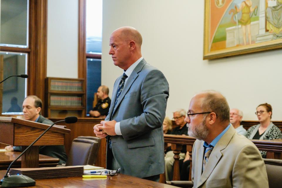 Village of Sugarcreek Sgt. Jeffrey A. Stearns, right, appears with his attorney, Matthew P. Mullen, for arraignment on charges related to engaging in a pattern of corrupt activity, among others before Judge Elizabeth Lehigh Thomakos in the Tuscarawas County Court of Common Pleas.