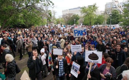 Hungarians protest against the rightwing government at a rally organised by spoof Two-tailed Dog Party in Budapest, Hungary, April 22, 2017. REUTERS/Bernadett Szabo