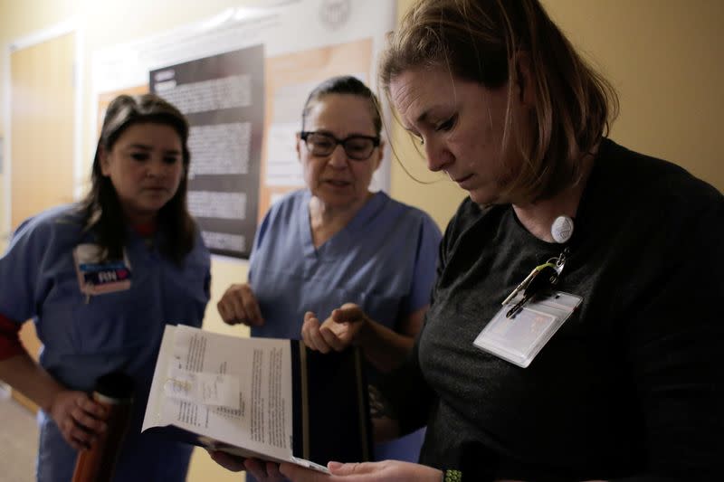 Harborview Medical Center's home assessment team prepare to visit the home of a person potentially exposed to novel coronavirus at Harborview Medical Center in Seattle