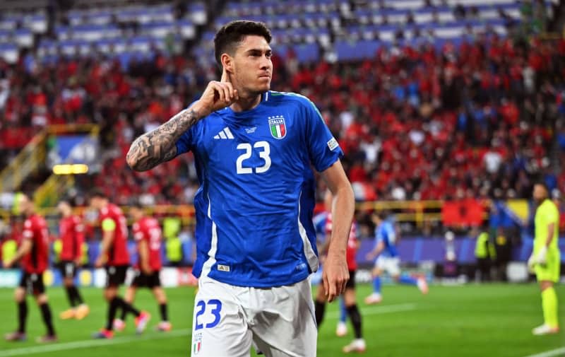 Italy's Alessandro Bastoni celebrates scoring his side's first goal during the UEFA Euro 2024 group B soccer match between Italy and Albania at the Dortmund stadium. Bernd Thissen/dpa