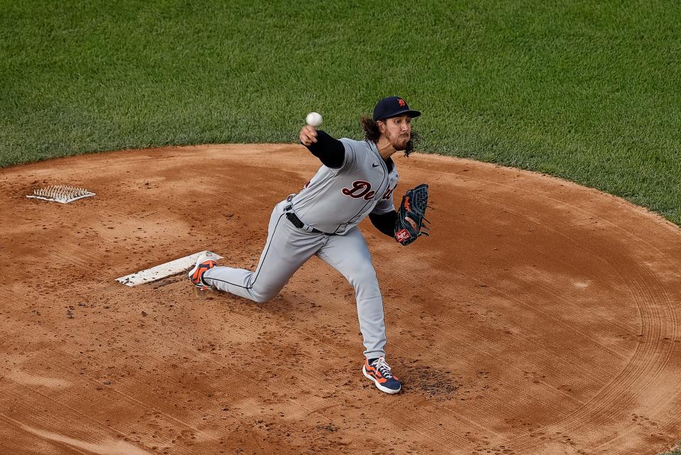 Detroit Tigers starting pitcher Michael Lorenzen (21) pitches in the first inning against the Colorado Rockies at Coors Field in Denver on Friday, June 30, 2023.