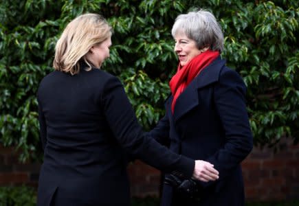 Britain's Prime Minister, Theresa May, greets Northern Ireland Secretary Karen Bradley at Stormont House, in Belfast, Northern Ireland February 12, 2018. REUTERS/Clodagh Kilcoyne