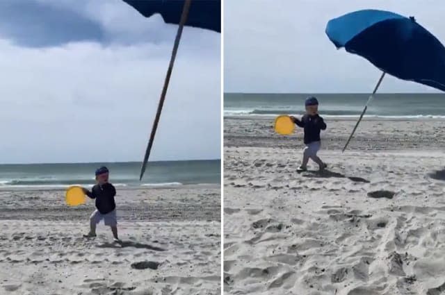 Toddler nearly impaled by flying beach umbrella