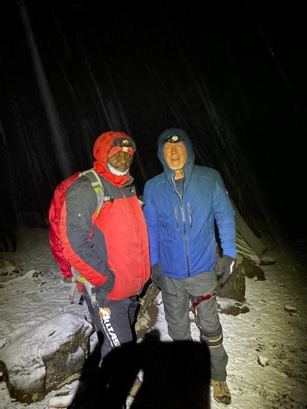 David Hill and Salim, his guide, in Tanzania, Africa where they climbed Mount Kilimanjaro early December 2021.