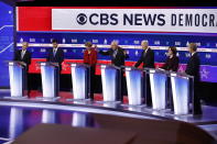 From left, Democratic presidential candidates, former New York City Mayor Mike Bloomberg, former South Bend Mayor Pete Buttigieg, Sen. Elizabeth Warren, D-Mass., Sen. Bernie Sanders, I-Vt., former Vice President Joe Biden, Sen. Amy Klobuchar, D-Minn., and businessman Tom Steyer, participate in a Democratic presidential primary debate at the Gaillard Center, Tuesday, Feb. 25, 2020, in Charleston, S.C., co-hosted by CBS News and the Congressional Black Caucus Institute. (AP Photo/Patrick Semansky)