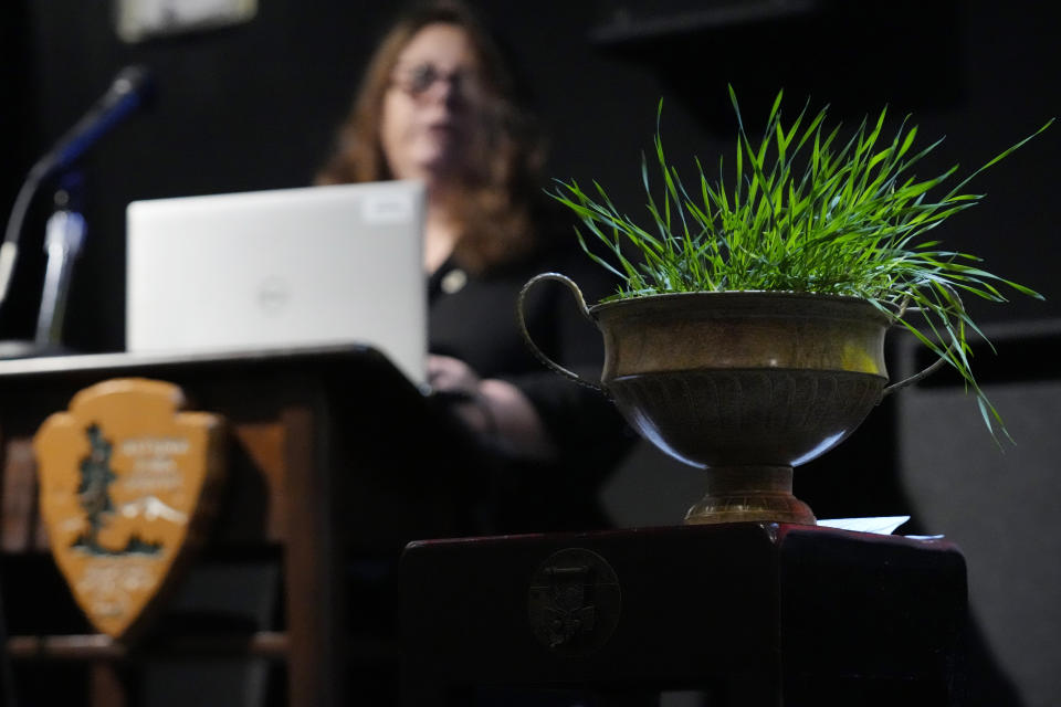 A small pot of soil and grass representing the final resting place of 13 Union soldiers of the United States 1st Mississippi Infantry (African descent) is part of a Remembrance and Libation Ceremony for the men who were finally identified at the Vicksburg National Military Park, Feb. 17, 2024, in Vicksburg, Miss. (AP Photo/Rogelio V. Solis)