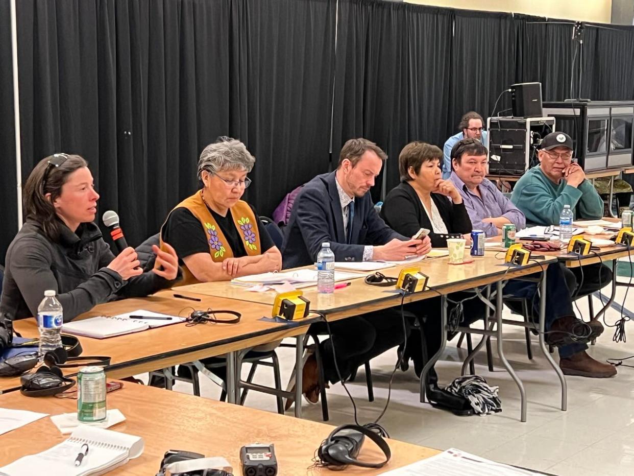 MLAs and community members discuss the proposed Missing Persons Act in Inuvik on Wednesday night.  (Dez Loreen/CBC - image credit)