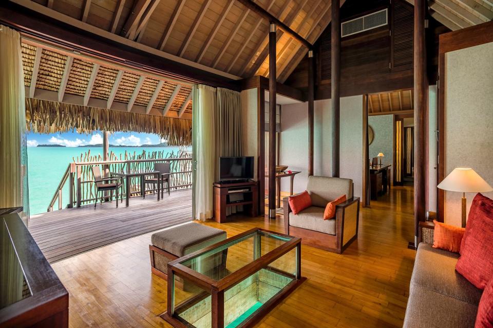 a living room with a pool table