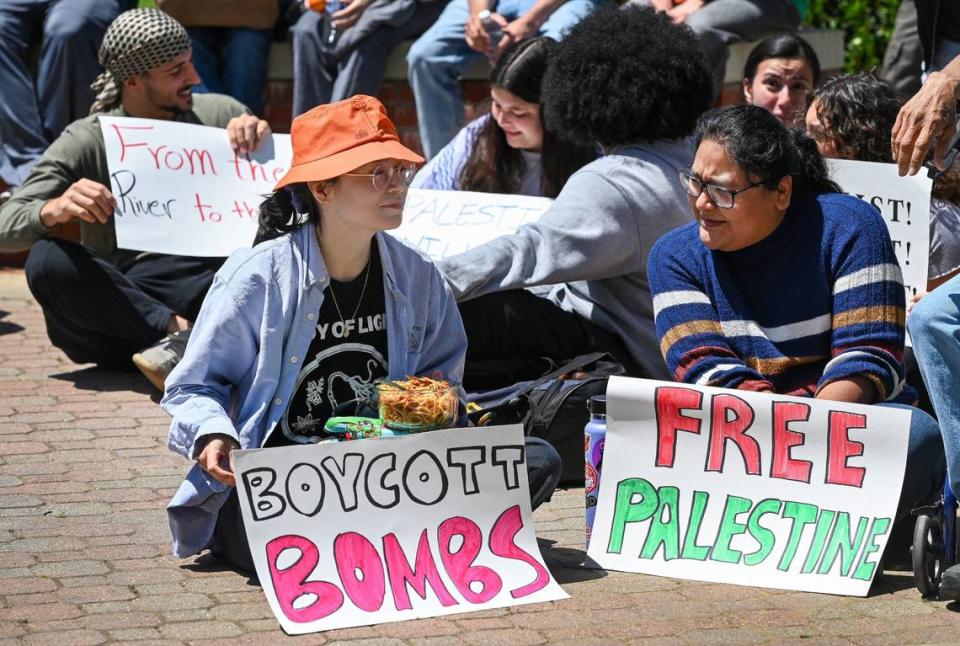 Students sit peacefully in the Fresno State Free Speech area on campus during a pro-Palestinian demonstration organized by Students for Palestinian Liberation on Wednesday, May 1, 2024.