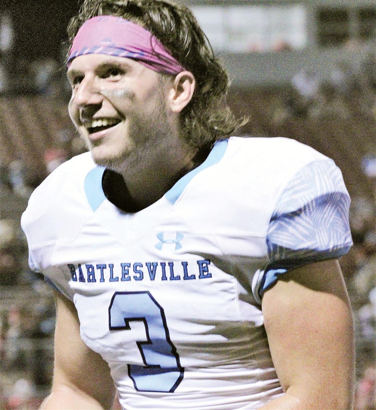 Bartlesville High's Rhett Foreman celebrates shortly after catching a touchdown pass in the final minute in last season's 15-14 win at Claremore High.