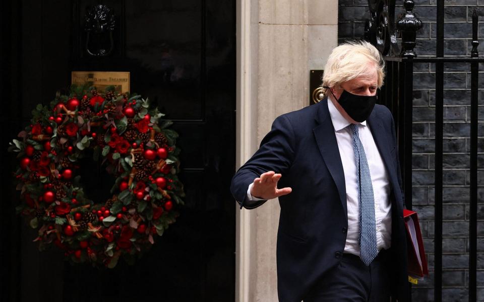 Boris Johnson Covid pound FTSE 100 Plan B omicron - ADRIAN DENNIS/AFP via Getty Images