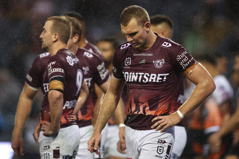 Tom Trbojevic reacts during a NRL game.