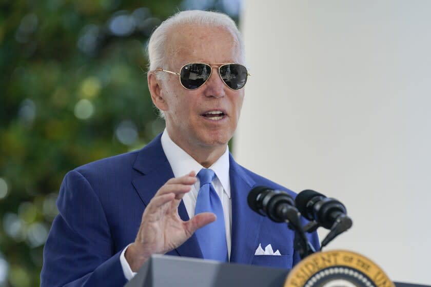 FILE - President Joe Biden speaks before signing two bills aimed at combating fraud in the COVID-19 small business relief programs Friday, Aug. 5, 2022, at the White House in Washington. Biden tested negative for COVID-19 on Saturday morning but will continue to isolate until a second negative test, his doctor said. (AP Photo/Evan Vucci, Pool, File)