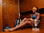 Serena Williams of United States of America poses with the Coupe Suzanne Lenglen in her changing room after her women's singles final match against Maria Sharapova of Russia during day fourteen of French Open at Roland Garros on June 8, 2013 in Paris, France.