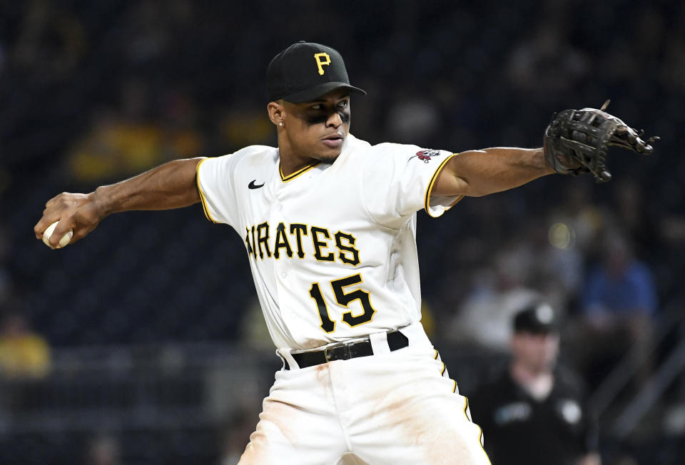 Pittsburgh Pirates third baseman Wilmer Difo pitches in the ninth inning against the St. Louis Cardinals in a baseball game Saturday, Aug. 28, 2021, in Pittsburgh. (AP Photo/Philip G. Pavely)