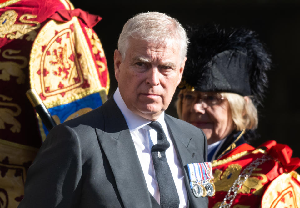 EDINBURGH, SCOTLAND - SEPTEMBER 12:  Prince Andrew, Duke of York is seen leaving St Giles Cathedral on September 12, 2022 in Edinburgh, Scotland. King Charles III joins the procession accompanying Her Majesty The Queen's coffin from the Palace of Holyroodhouse along the Royal Mile to St Giles Cathedral. The King and The Queen Consort, accompanied by other Members of the Royal Family also attend a Service of Prayer and Reflection for the Life of The Queen where it lies in rest for 24 hours before being transferred by air to London. (Photo by Samir Hussein/WireImage)