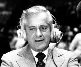 FILE - In this Sept. 15, 1978, file photo, Curt Gowdy, the dean of network sportscasters, wears a headset. A versatile announce nicknamed the Cowboy who started off as Mel Allen's partner on Yankees radio broadcasts, Gowdy was one of the original voices of the AFL on ABC when the league started in 1960. He moved on to NBC in 1965 and was in the booth for some of the most memorable games in pro football history. (AP Photo/File)