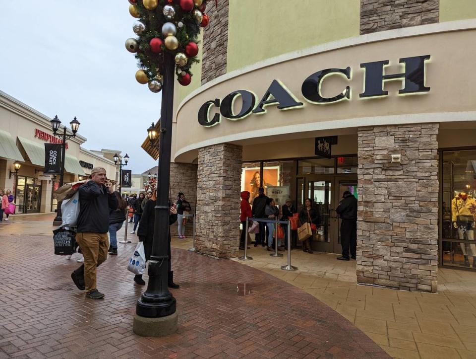 Charlotte Premium Outlets in Steele Creek had long lines at some stores like Coach on Black Friday.