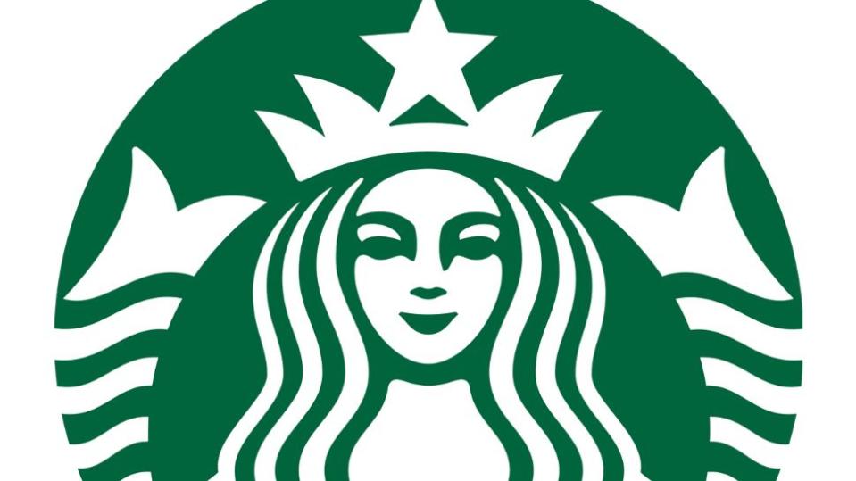 Close view of 2011 Starbucks logo showing asymmetry in the design of the siren