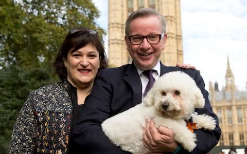 Michael Gove with his wife Sarah and dog Snowy - Credit: Heathcliff O'Malley/The Telegraph