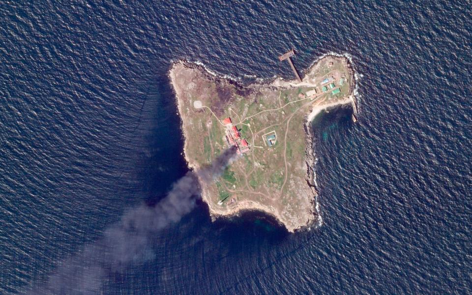 Russia seized Snake Island early in the invasion, but has since been driven out. This satellite image shows smoke rising after a Ukrainian drone strike on Russian positions early in 2022