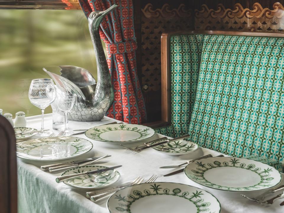 a set table on the Cygnus carriage as the train moves