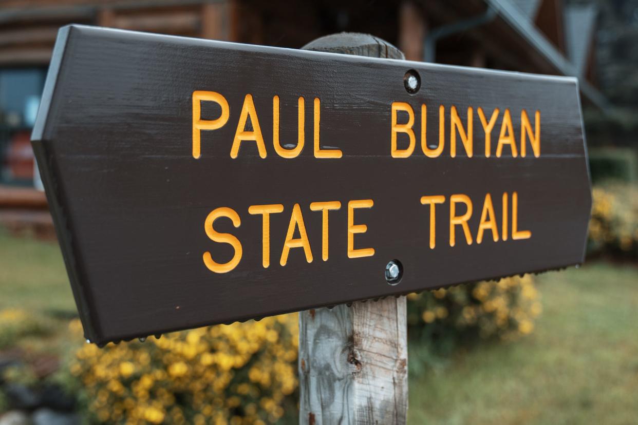 a sign for the paul bunyan state trail in pine river, crow wing county, minnesota