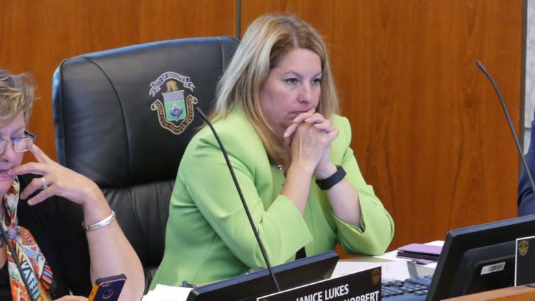 Wyatt absent as council considers forcing paid leave for members facing criminal charges