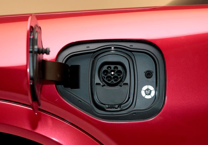 FILE PHOTO: The charging socket is seen on Ford Motor Co's electric Mustang Mach-E vehicle during a photo shoot at a studio in Warren, Michigan
