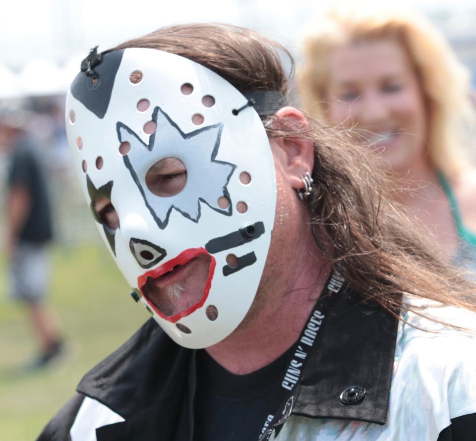 Kenny Dotson, a KISS fan from Charlotte, North Carolina, arrived in his own custom-made KISS hockey mask decorated with the images associated with each of the original band members.