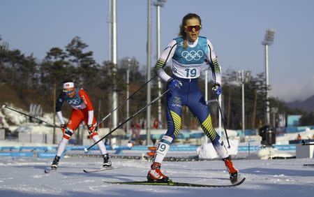 Cross-Country Skiing - Pyeongchang 2018 Winter Olympics - Women's 30km Mass Start Classic - Alpensia Cross-Country Skiing Centre - Pyeongchang, South Korea - February 25, 2018 - Stina Nilsson of Sweden in action to clinch bronze. REUTERS/Carlos Barria