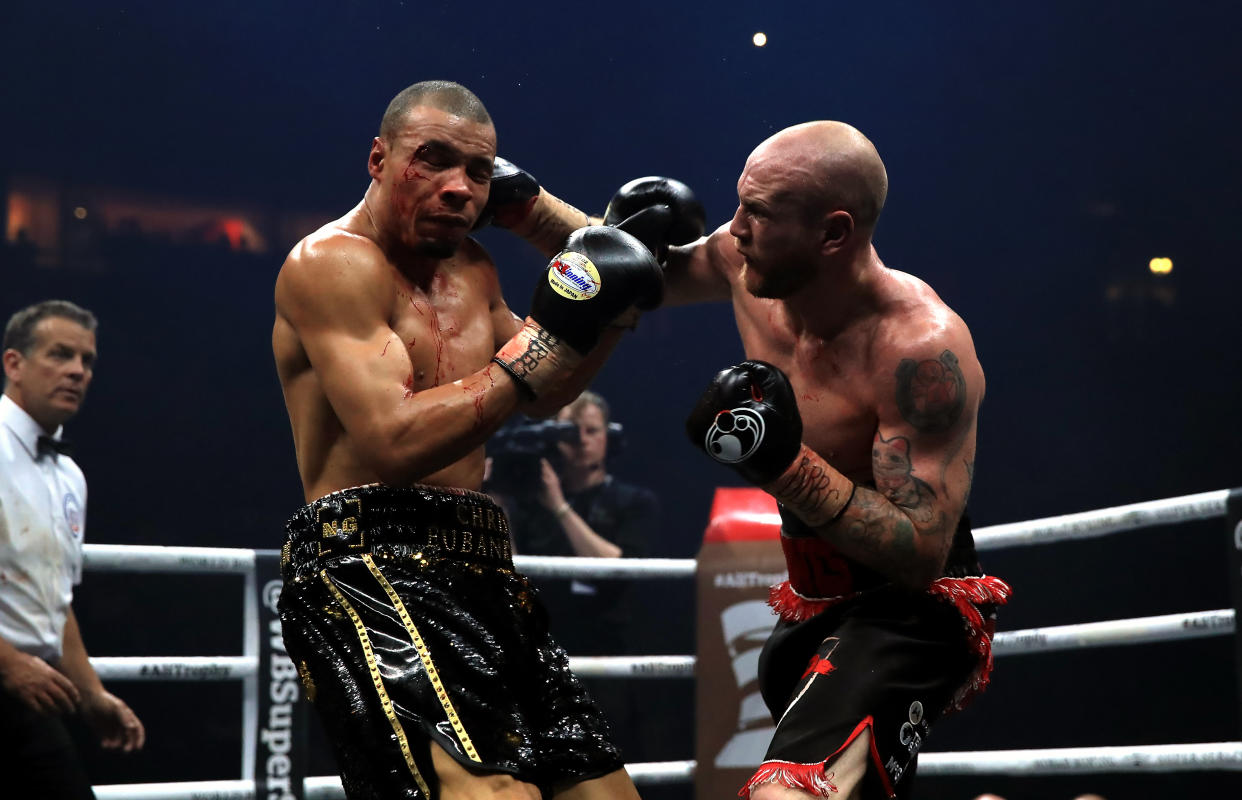 George Groves (right) lands a right hook on the head of Chris Eubank Jnr