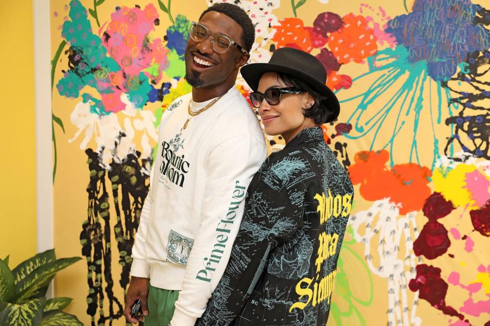 Nnamdi Okafor and Rosario Dawson visit the Awake NY x UPS Pop-Up for NYFW: The Shows on September 10, 2022 in New York City.